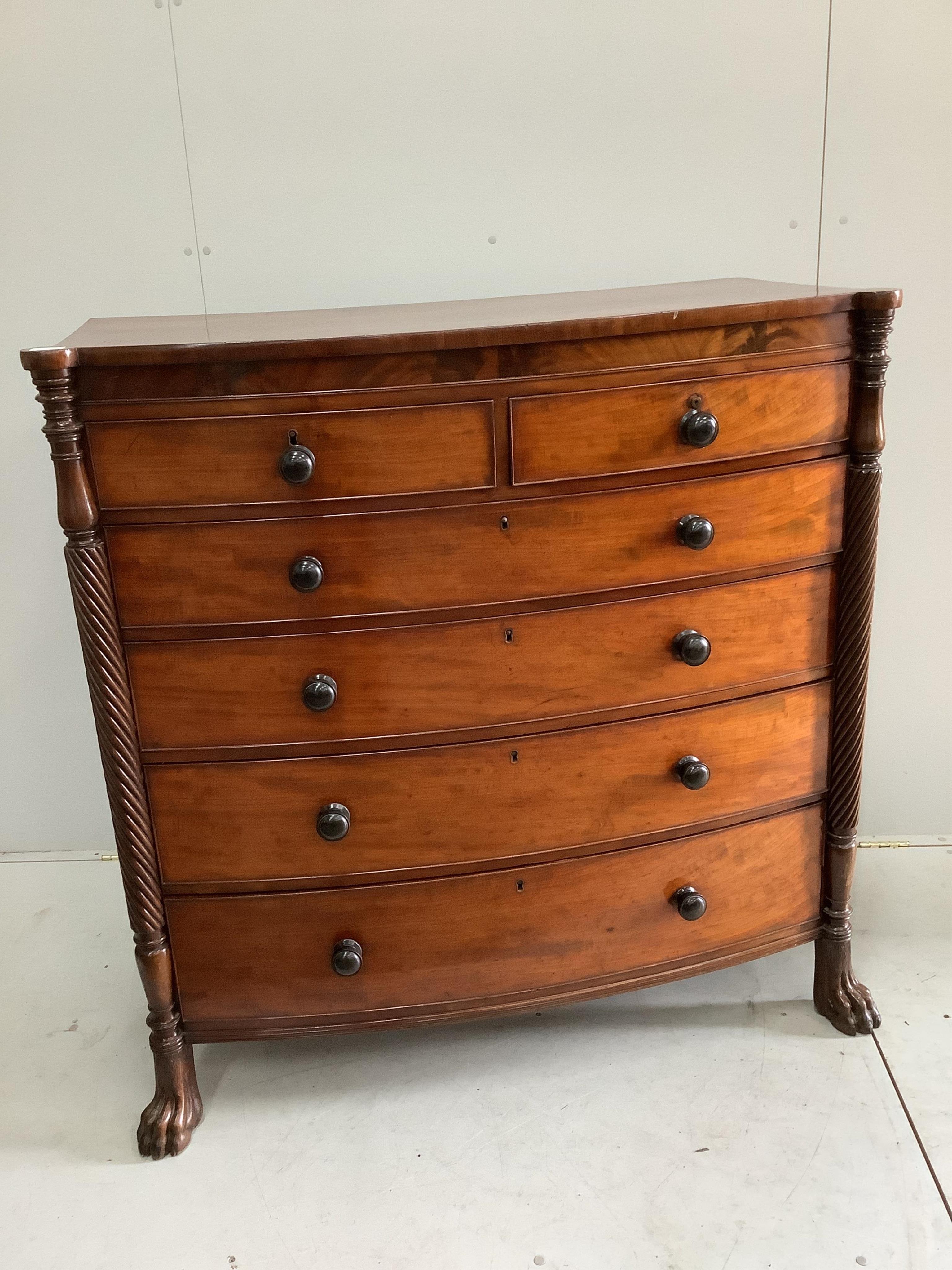 An early Victorian mahogany bowfront chest on lion paws feet, width 121cm, depth 57cm, height 124cm